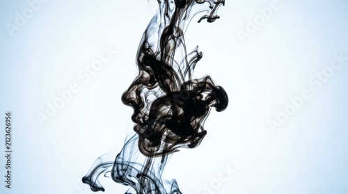 Ink Face Profile Emerging in Water