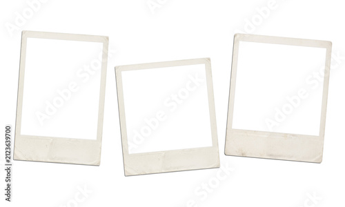 Three old vintage polaroid frames scattered on transparent background for web project.