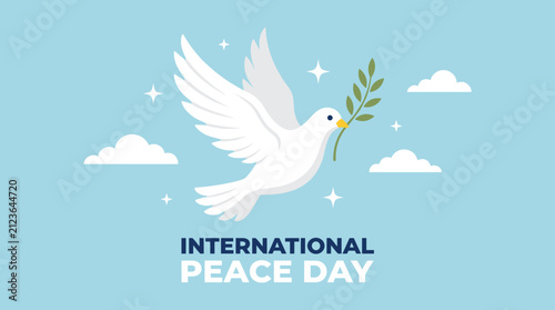 International Day of Peace white dove flying with olive branch in sky