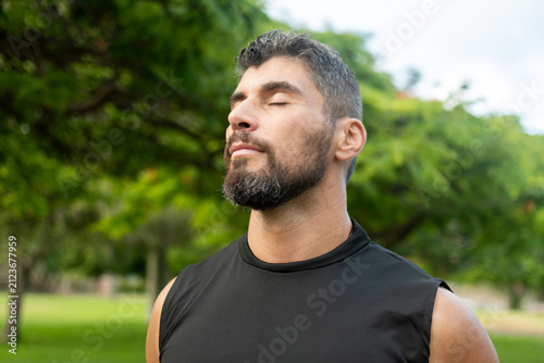 Man practicing mindful breathing outdoors