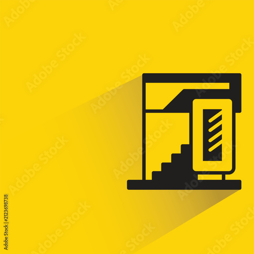 modern house building with shadow on yellow background