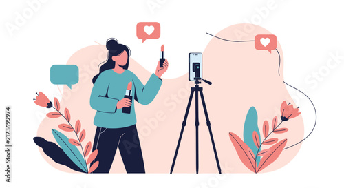 Female beauty influencer records a video tutorial about lipstick and cosmetics using her smartphone on a tripod at home.