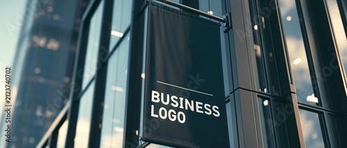 Vertical banner mockup business logo hanging sign wall banner glass building urban exterior office facade storefront display sign mockup blank