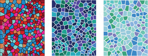 A vibrant stained glass mosaic pattern featuring three distinct panels with red blue and light blue geometric tiles arranged in a beautiful artistic decorative composition