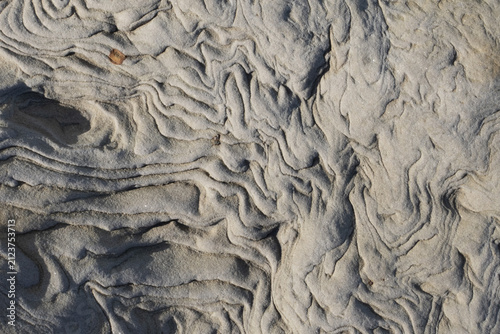 Sandstone rock showing natural ripple patterns formed by erosion over time