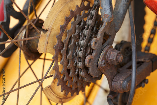 heavily rusted bicycle rear cassette, chain, derailleur with visible corrosion and oxidation, bicycle maintenance, drivetrain wear, mechanical deterioration, need for cleaning, lubrication, and repair