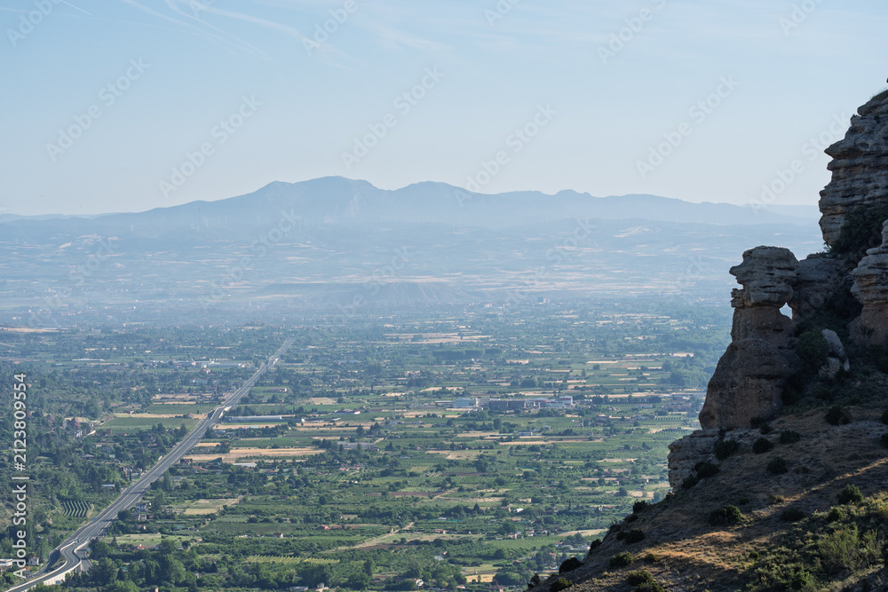 Obraz premium Cliffside View Over La Rioja Valley and Highway