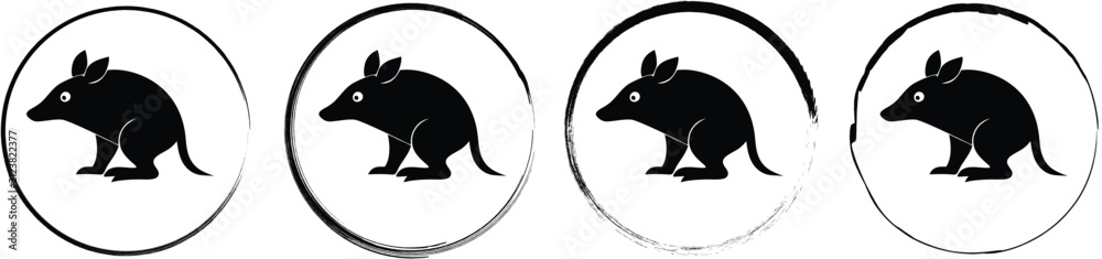 Fototapeta premium A set of four circular featuring a black silhouette of an armadillo animal, presented on a white background, for your creative projects