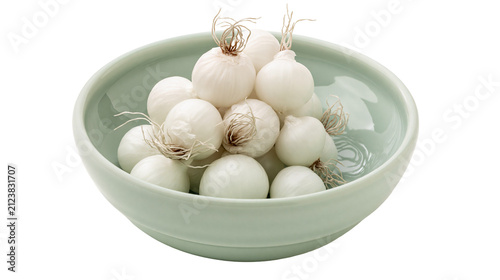 Konstfotografi Pile of small white pearl onions in a pale green ceramic bowl, isolated on trans