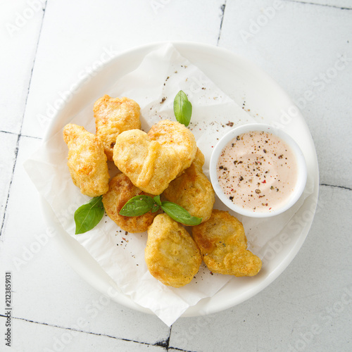 Homemade chicken nuggets with sauce