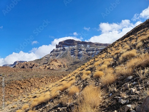 Arid mountain landscape under a clear blue sky