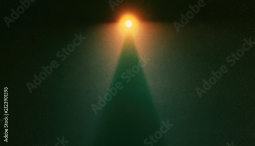 A bright yellow spotlight shines down on a dark, hazy, green-tinged background