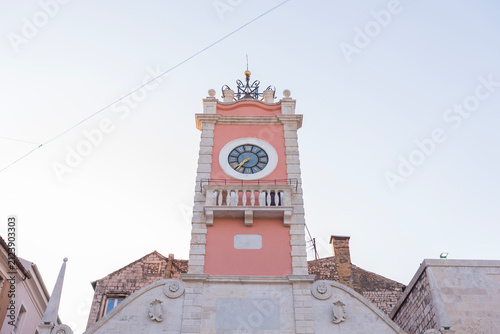 Fotografie Historic city guard clock tower low angle view in Zadar, Croatia