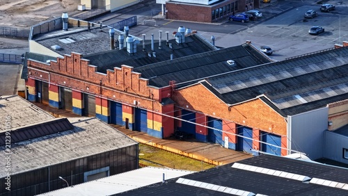 Fotografía April 21, 2026 – Graaff, Elze, Lower Saxony, Germany: Aerial editorial view of a historic brick industrial workshop within the Graaff manufacturing complex in Elze