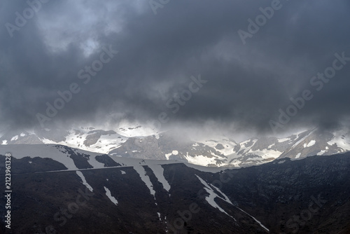 Dramatic storm clouds over Ligurian Alps mountain range, Italy