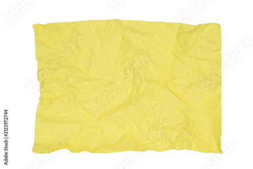 Принти на полотні crumpled bright yellow paper sheet lies on a white isolated background