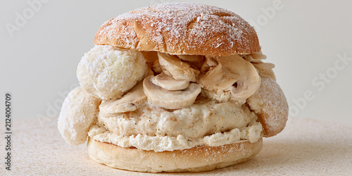Surreal Monochrome All-White Burger with Mushrooms and Coconut Balls on a Minimalist Textured Background