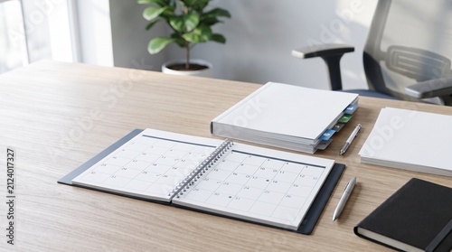 Organized Workspace: A neatly arranged desk with an open calendar, notebook, and pen, illuminated by soft natural light, promoting productivity and planning.