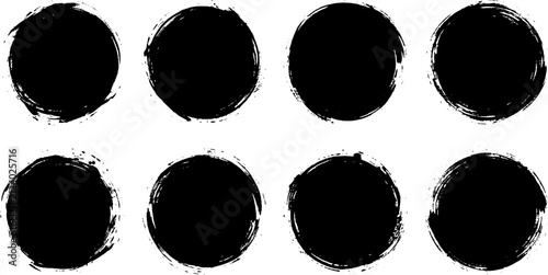 Circle brush stroke icon set. Collection of round distressed black ink shapes in a grunge style. Editable vector illustration on white background.