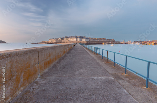 Historic Stone Buildings and City Walls at Sunset in Saint Malo, France