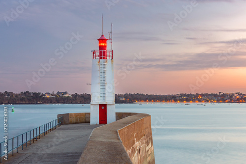 Red Harbor Lighthouse on Breakwater at Sunset in Saint Malo, France