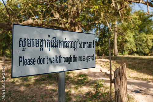 A sign at the monument in Phnom Penh to the victims of the Khmer Rouge at a  mass grave site, Cambodia.