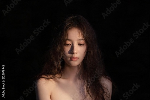 Theatrical Spotlight Lit Artistic Woman Portrait