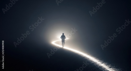 Man Walking on a Glowing Path Through Fog