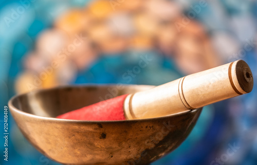 Konstfotografi Calm mind with an old singing bowl on colorful background.