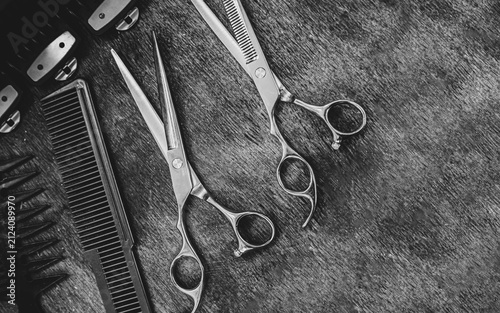 combs and scissors for haircuts lie on a shelf in the cabin