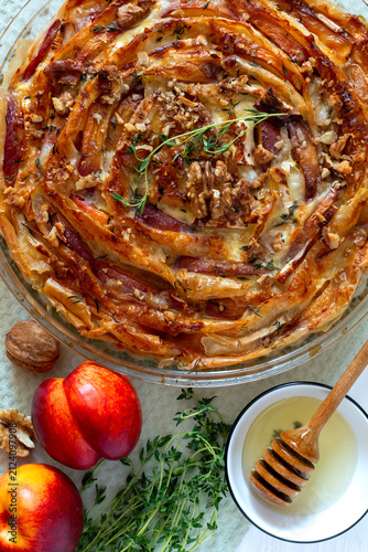 Pie with nectarines and camembert.