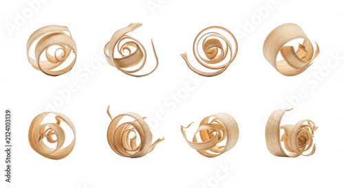 wood shavings arranged artfully on white backdrop suggesting carpentry and woodworking use with bright studio lighting