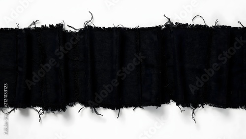 Black fabric strip with frayed edges. Torn textile ribbon isolated on white background.