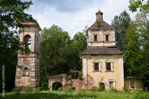 The ruins of the ancient church of the Kazanskaya Icon of the Mother of God (1733) on a sunny June day. Posadnikovo village. Pskov region, Russia