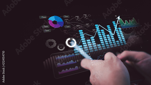Obraz na płótnie Business strategist evaluates business performance, financial analytics, interactive dashboard, data visualization, market trends, business intelligence, growth forecasting to drive smarter decisions