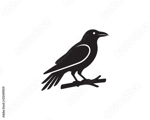 Black crow bird sitting on a tree branch silhouette icon