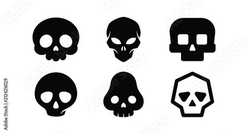 Bild auf Leinwand Collection Of Black Skull Silhouettes With Varied Designs Against A White Backgr
