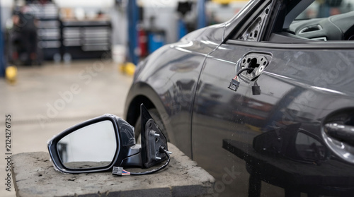 Replacement Side Mirror Ready for Installation on Passenger Car