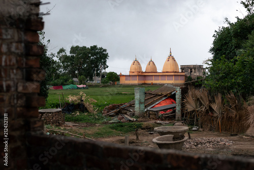 Photography Hindu Temple Viewed Through an Old Rural Structure