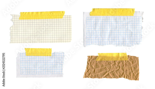 Collection of realistic torn notebook and kraft paper pieces with yellow masking tape isolated on white background. Set of paper mockup elements for scrapbooking, journaling and branding.