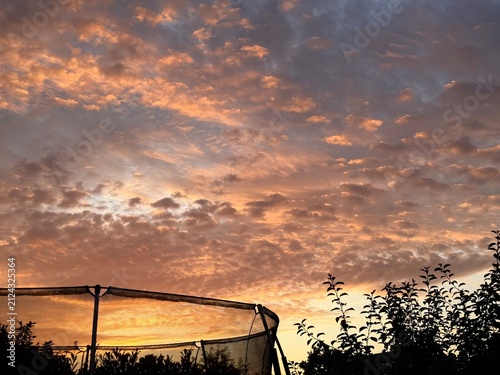 fantastic orange cloudy sky after the sunset