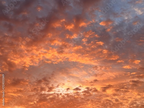 fantastic orange cloudy sky after the sunset
