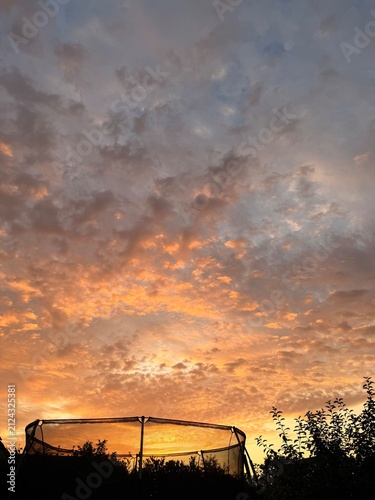 fantastic orange cloudy sky after the sunset