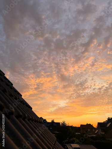 fantastic orange cloudy sky after the sunset