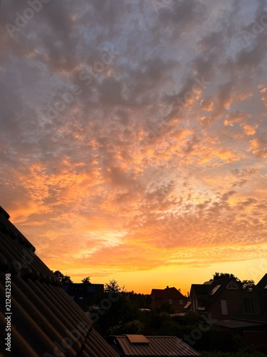 fantastic orange cloudy sky after the sunset