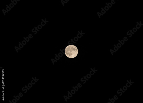 Bright Full Moon in Clear Night Sky with Copy Space