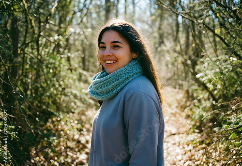 Smiling young woman with lo...