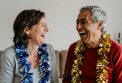 Happy senior couple laughin...