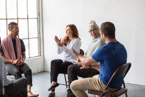 Fotografía Diverse group engaged in discussion.