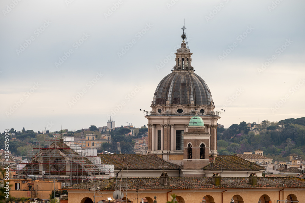Naklejka premium City view on roofs and churches of Rome from panoramic route near villas Borghese and Medici, walking in Rome in spring evening, soft sunset lights, guided tour